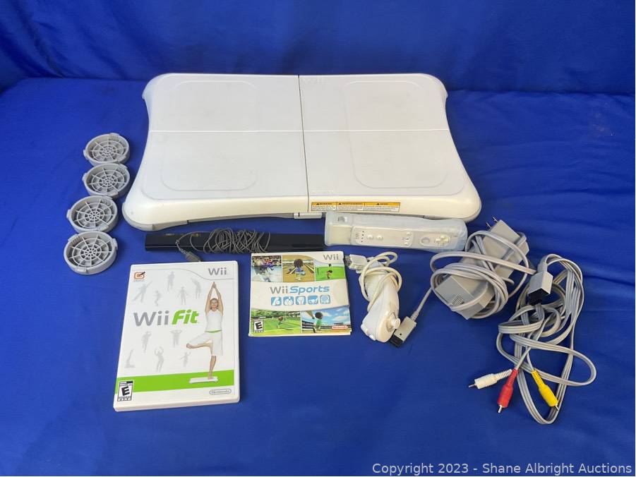 Nintendo Wii Fit and Wii Sports with Board and Controller Auction